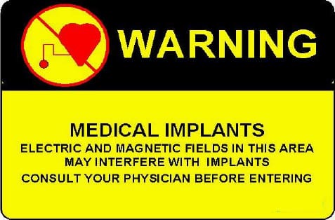 Warning about medical implants due to electric and magnetic fields in a substation